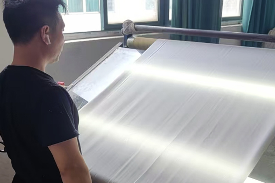 染色工場生産・完成品検査場