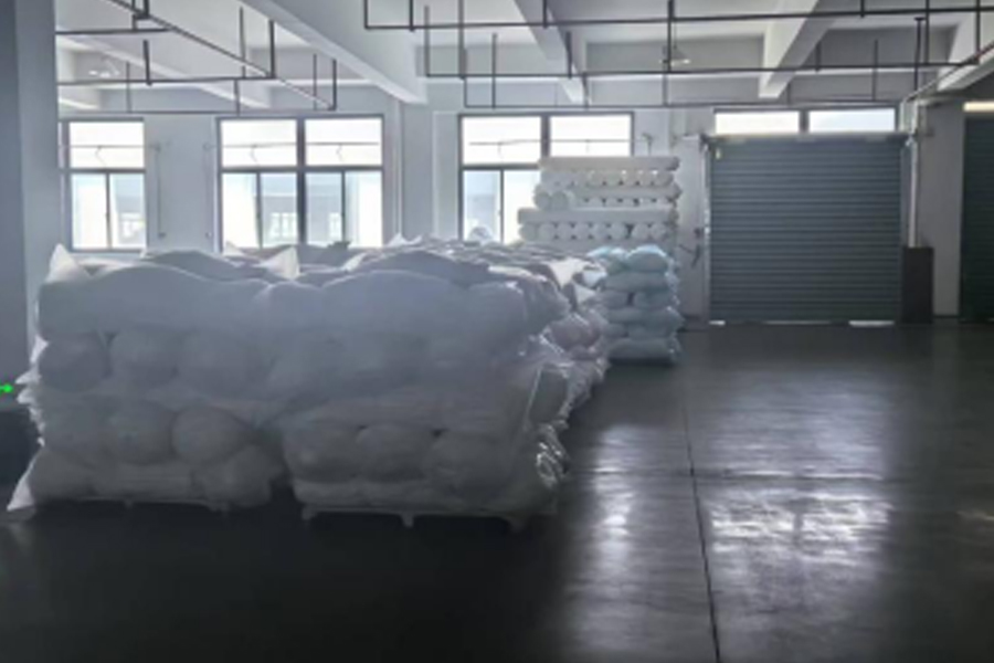 グレー生地の生産から配送までのエリア